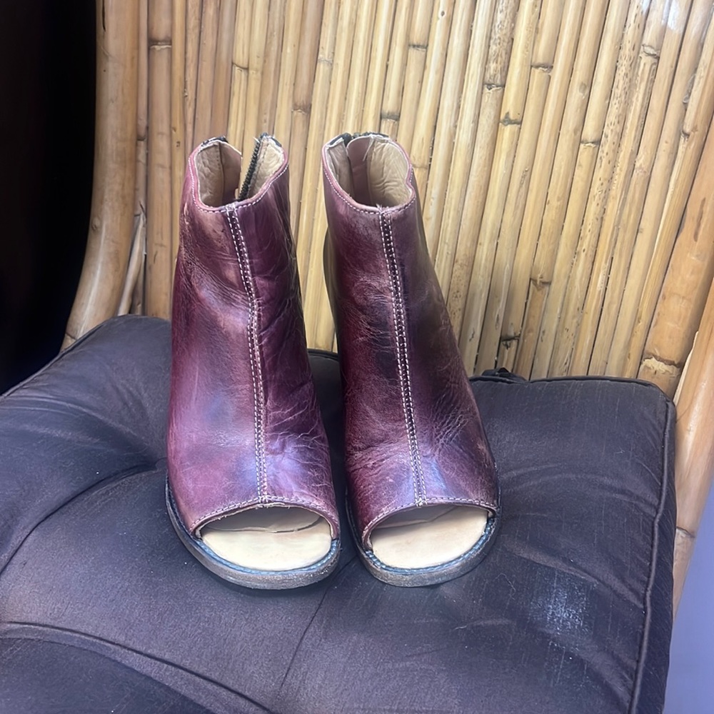 open toed thick heeled boots.